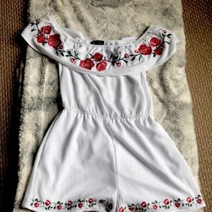 Size-medium, white romper, never worn